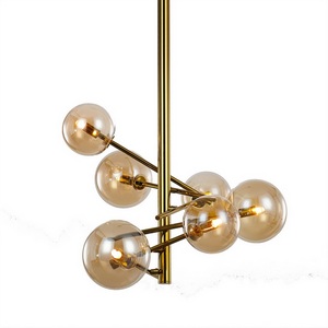 Потолочная люстра на штанге MX19009070-6B DeLight Collection Globe Mobile gold в форме шара